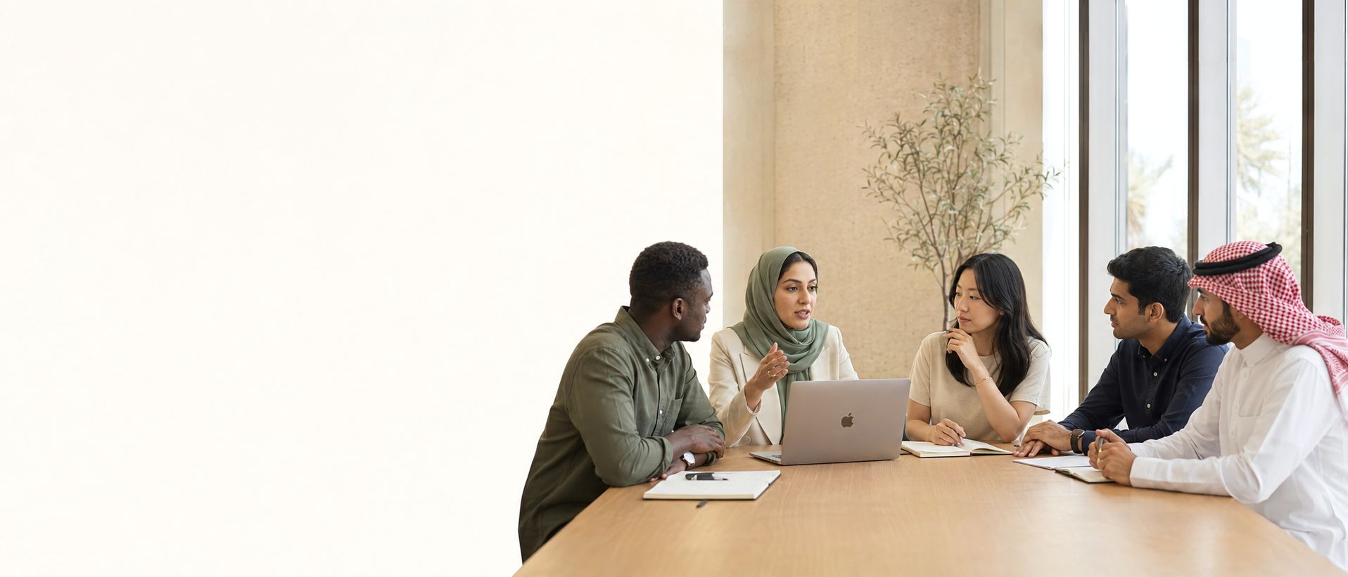 University faculty around a table, talking through a course